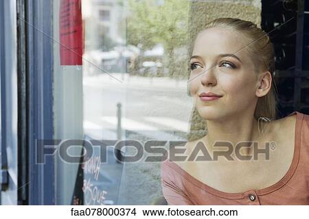 Youn woman daydreaming, portrait View Large Photo Image Picture - Youn woman daydreaming, portrait. Fotosearch
