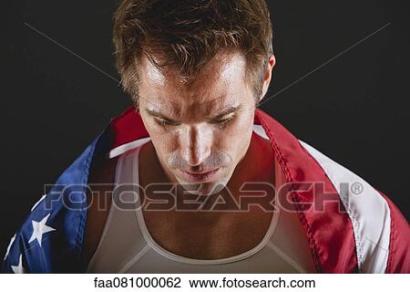 Stock Image - Athlete covered with American flag. Fotosearch