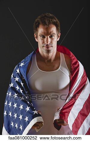 Athlete covered with American flag, portrait View Large Photo Image Stock Image - Athlete covered with American flag, portrait. Fotosearch