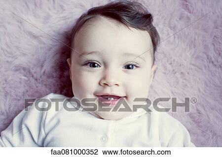 Stock Image - Baby girl, portrait. Fotosearch