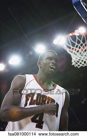 Picture - Basketball player cheering. Fotosearch