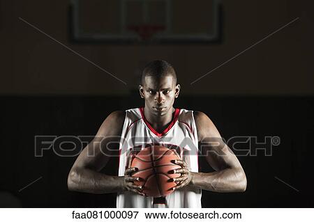 Basketball player preparing to shoot basket View Large Photo Image Stock Photo - Basketball player preparing to shoot basket. Fotosearch