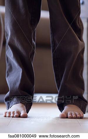 Stock Photo - Boy's legs, low section. Fotosearch