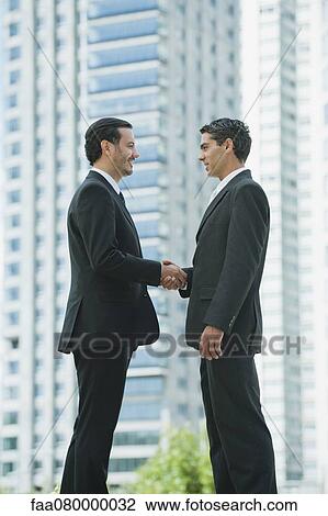Business executives shaking hands View Large Photo Image Stock Image - Business executives shaking hands. Fotosearch