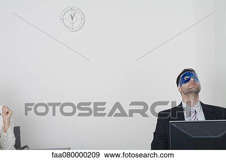 Businessman wearing eye mask View Large Photo Image Stock Photo - Businessman wearing eye mask. Fotosearch