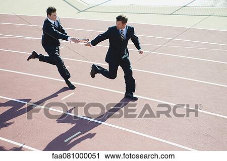 Stock Image - Businessmen running relay race. Fotosearch