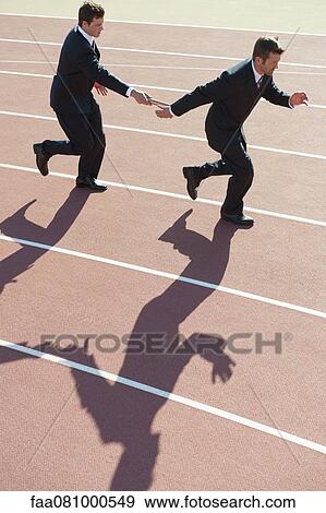 Stock Photo - Businessmen running relay race. Fotosearch