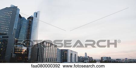 City skyline against pastel-colored sky, panoramic view View Large Photo Image Stock Image - City skyline against pastel-colored sky, panoramic view. Fotosearch