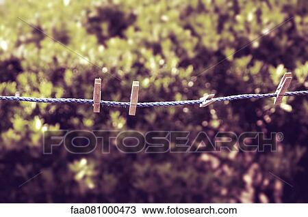 Clothes pins on clothesline View Large Photo Image Stock Image - Clothes pins on clothesline. Fotosearch