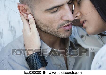 Picture - Couple about to kiss. Fotosearch