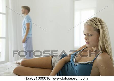 Stock Photograph - Couple experiencing relationship difficulties. Fotosearch