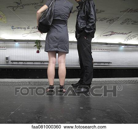 Couple waiting on subway platform View Large Photo Image Stock Image - Couple waiting on subway platform. Fotosearch