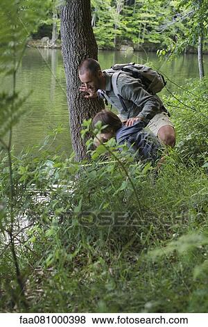 Stock Photo - Father and son fishing. Fotosearch
