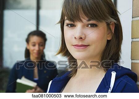 Stock Image - Female college student, portrait. Fotosearch