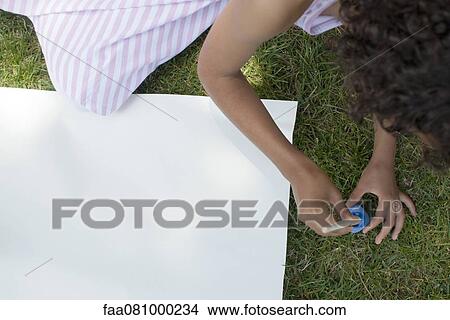 Picture - Girl preparing paint for drawing, cropped. Fotosearch