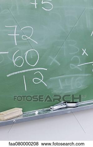 Handgun resting on blackboard in classroom View Large Photo Image Stock Photo - Handgun resting on blackboard in classroom. Fotosearch