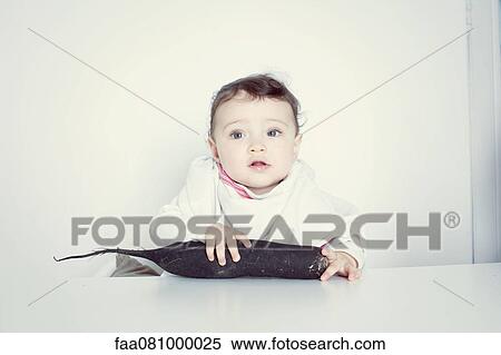 Infant and root vegetable, portrait View Large Photo Image Stock Photography - Infant and root vegetable, portrait. Fotosearch