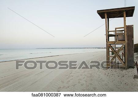 Stock Photo - Lifeguard stand on deserted beach. Fotosearch
