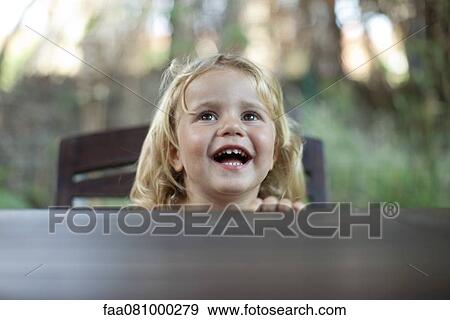 Little girl laughing View Large Photo Image Stock Photo - Little girl laughing. Fotosearch