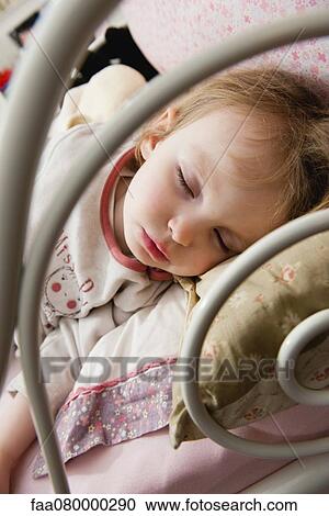 Little girl napping, close-up View Large Photo Image Stock Image - Little girl napping, close-up. Fotosearch