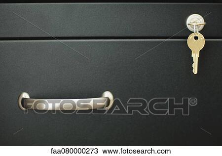 Stock Image - Locked drawer, close-up. Fotosearch