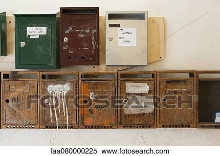 Mailboxes mounted on wall View Large Photo Image Stock Photography - Mailboxes mounted on wall. Fotosearch