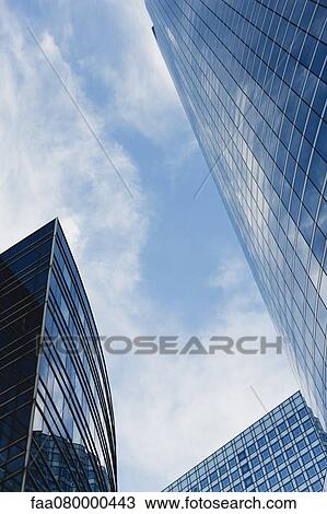 Modern office buildings, low angle view View Large Photo Image Stock Image - Modern office buildings, low angle view. Fotosearch
