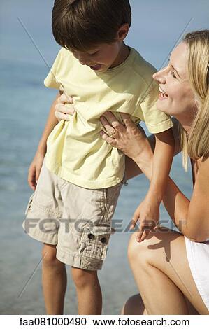 Mother and son bonding outdoors View Large Photo Image Stock Image - Mother and son bonding outdoors. Fotosearch