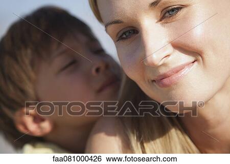 Mother and son, portrait View Large Photo Image Stock Photograph - Mother and son, portrait. Fotosearch