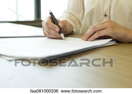 Person signing paperwork View Large Photo Image Stock Photograph - Person signing paperwork. Fotosearch