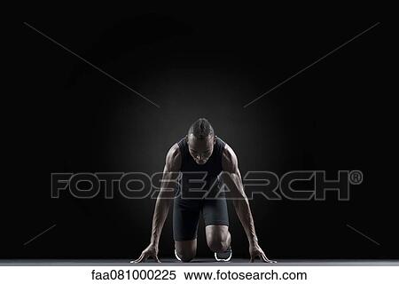 Stock Photography - Runner at starting line. Fotosearch