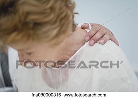Senior woman receiving bad news from doctor, cropped View Large Photo Image Stock Photograph - Senior woman receiving bad news from doctor, cropped. Fotosearch
