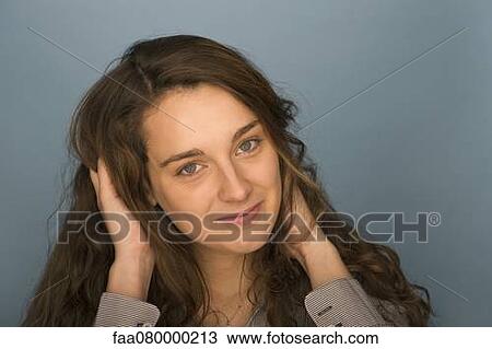 Smiling young woman, portrait View Large Photo Image Stock Image - Smiling young woman, portrait. Fotosearch