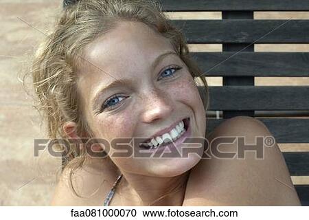 Smiling young woman, portrait View Large Photo Image Stock Image - Smiling young woman, portrait. Fotosearch