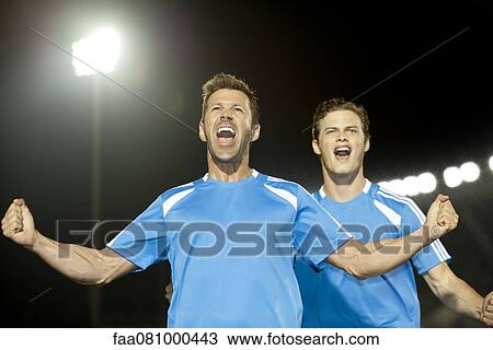 Soccer players celebrating, portrait View Large Photo Image Stock Image - Soccer players celebrating, portrait. Fotosearch