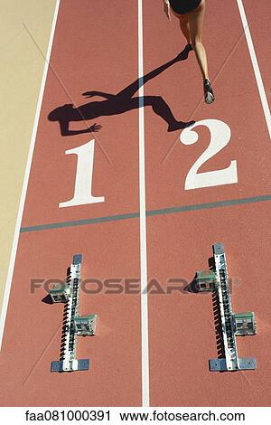 Starting blocks on tracks, athlete leaving starting line View Large Photo Image Stock Image - Starting blocks on tracks, athlete leaving starting line. Fotosearch