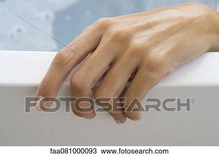 Stock Image - Wet hand. Fotosearch