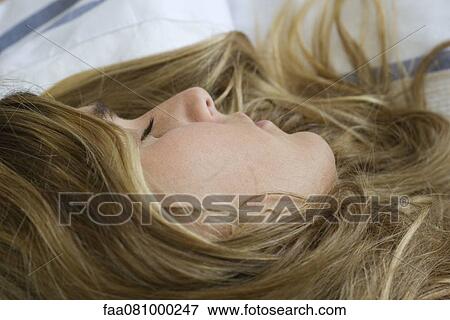 Woman sleeping, close-up View Large Photo Image Stock Photo - Woman sleeping, close-up. Fotosearch