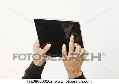 Woman using digital tablet, cropped View Large Photo Image Stock Image - Woman using digital tablet, cropped. Fotosearch