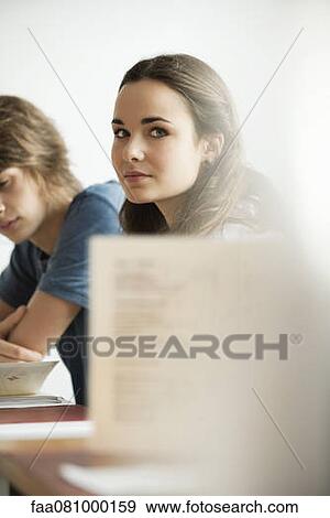 Young woman hanging out with friend View Large Photo Image Stock Photo - Young woman hanging out with friend. Fotosearch