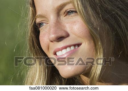 Stock Image - Young woman, portrait. Fotosearch