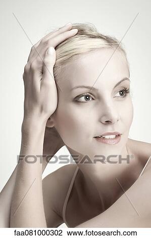 Stock Image - Young woman, portrait. Fotosearch