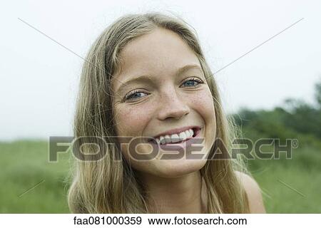 Stock Photo - Young woman, portrait. Fotosearch