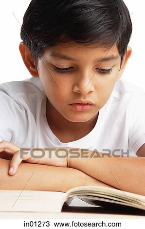Boy reading book View Large Photo Image Stock Image - Boy reading book. Fotosearch