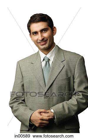 Businessman, looking at camera, portrait View Large Photo Image Stock Photo - Businessman, looking at camera, portrait. Fotosearch
