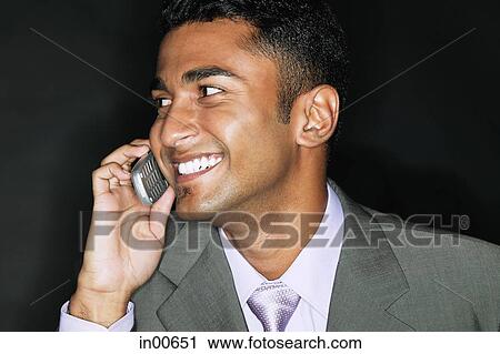 Businessman mobile phone, smiling View Large Photo Image Stock Image - Businessman mobile phone, smiling. Fotosearch