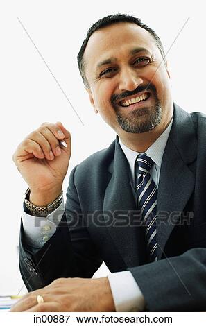 Businessman smiling View Large Photo Image Stock Photo - Businessman smiling. Fotosearch