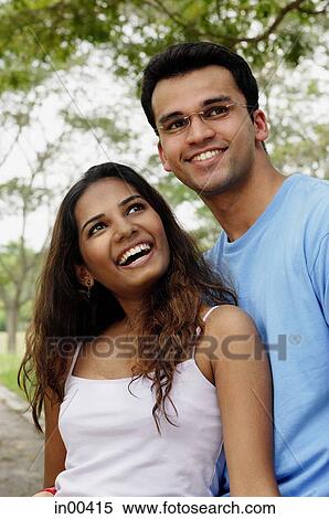Stock Photography - Couple, side by side, looking away. Fotosearch