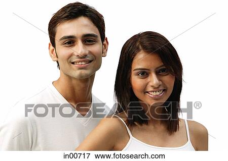 Couple smiling at camera, head shot View Large Photo Image Stock Photo - Couple smiling at camera, head shot. Fotosearch