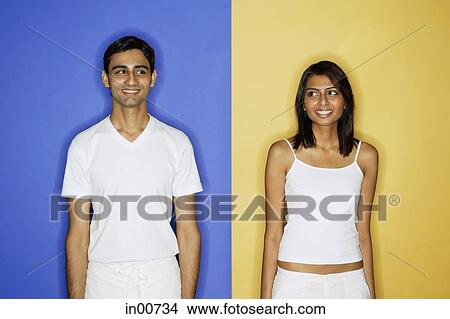 Couple standing apart View Large Photo Image Picture - Couple standing apart. Fotosearch